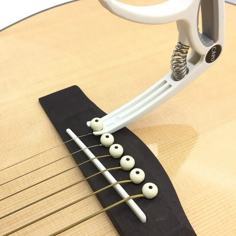 คาโปกีต้าร์พลาสติกสําหรับ 6 สา - Guitar Tuner Clip บทวิจารณ์และราคา